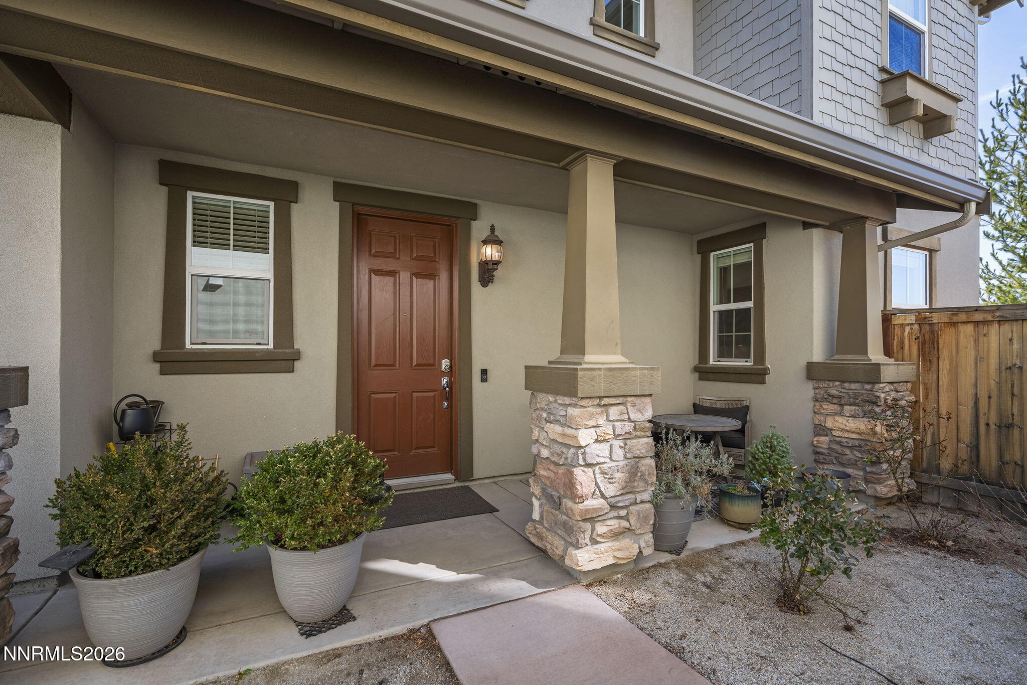 2220 Heavenly View Trail Reno, NV 89523 - Photo 2 of 29 a potted plant sitting in front of a house