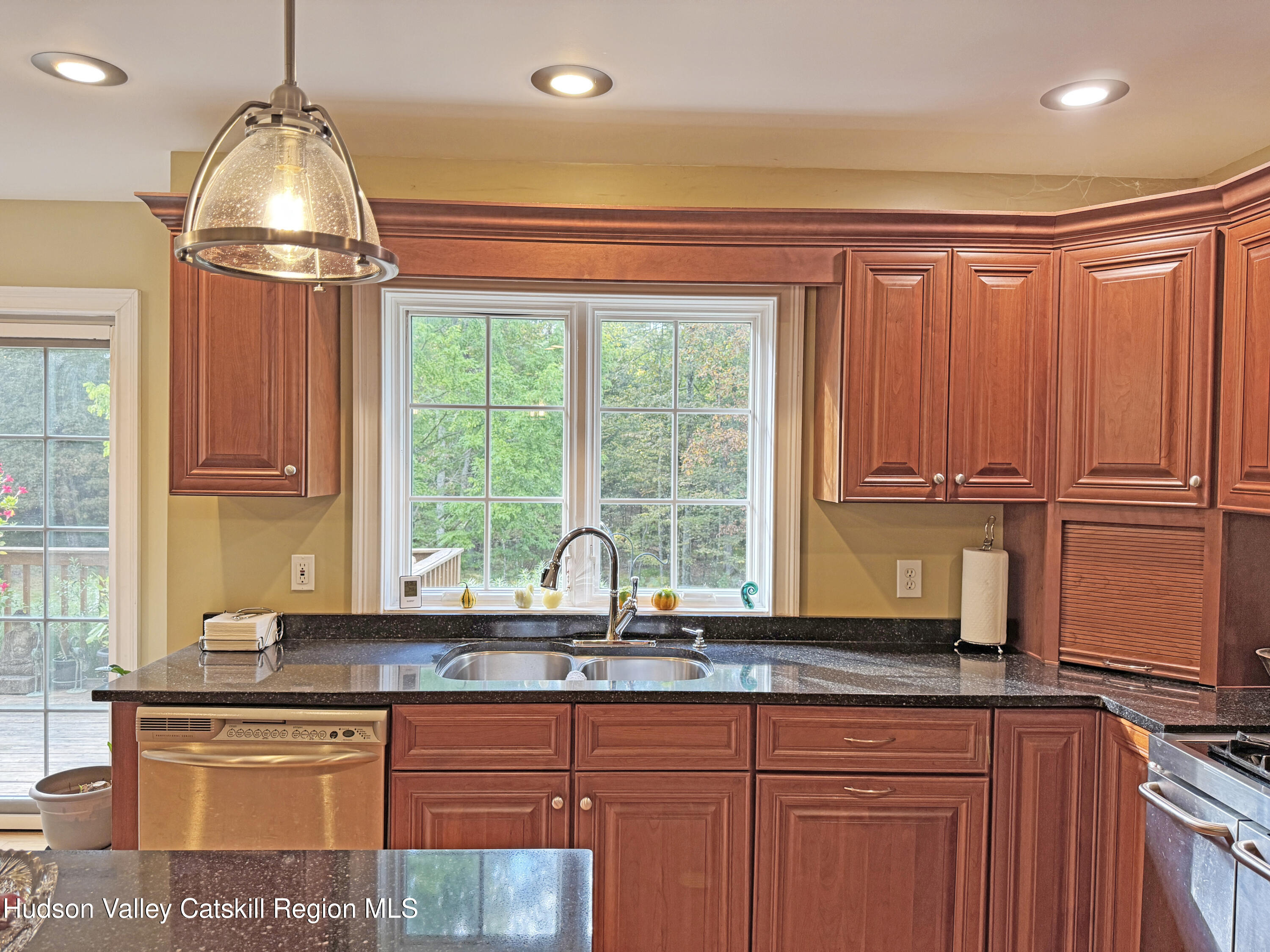 189 Bush Road Stone Ridge, NY 12484 - Photo 14 of 35 a kitchen with granite countertop a sink and a window
