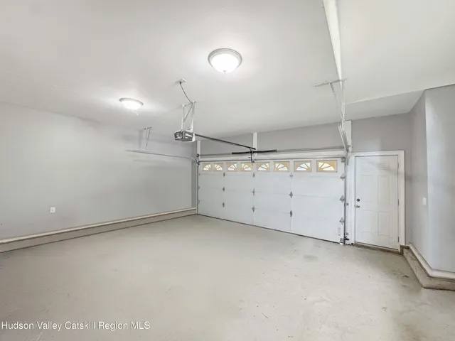 a garden view with a fountain