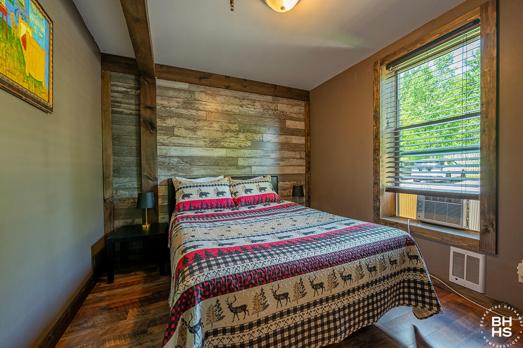 6143 Sentinel Road, Unit # 1 Lake Placid, NY 12946 - Photo 9 of 19 Downhill1Condo_Summer_Bedroom2