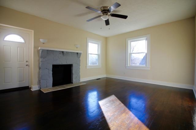 515 West 7th Avenue Springfield, TN 37172 - Photo 2 of 7 This large living room has beautiful refinished original hardwood floors. The fire place is equipped for gas.