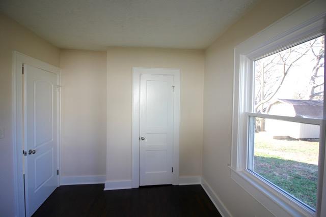 515 West 7th Avenue Springfield, TN 37172 - Photo 4 of 7 The smallest of the three bedrooms is located at the corner of the home. Window on two sides of the roof give in lots of natural light.