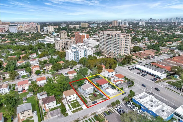 an aerial view of a city with lots of residential buildings