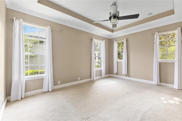 a bathroom with a shower a sink and a mirror