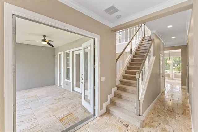 a view of hallway with stairs