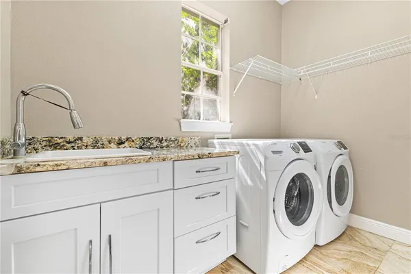 a view of hallway with stairs