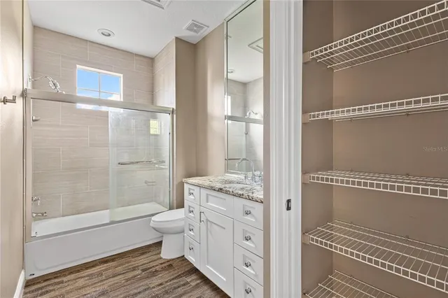 a view of a swimming pool with an outdoor space