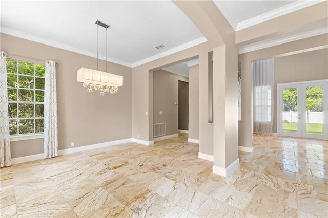 a view of an empty room and window