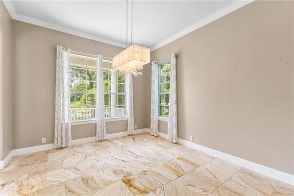 a view of a bedroom with windows