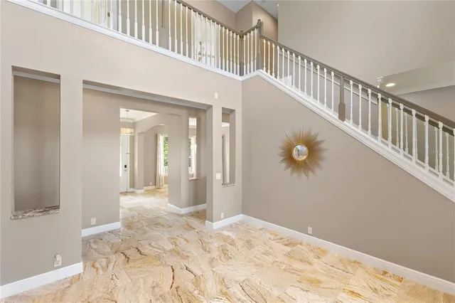 a view of staircase with large window