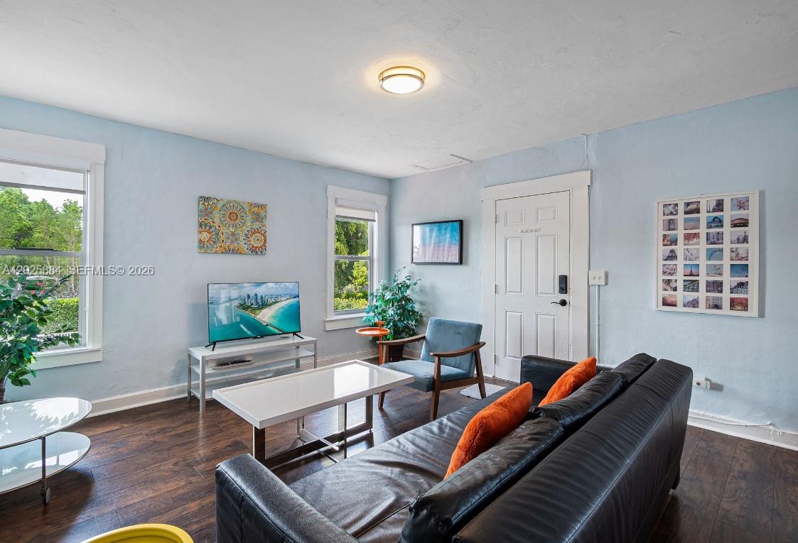 2255 Southwest 10th Street, Unit B Miami, FL 33135 - Photo 11 of 26 a living room with furniture and a window