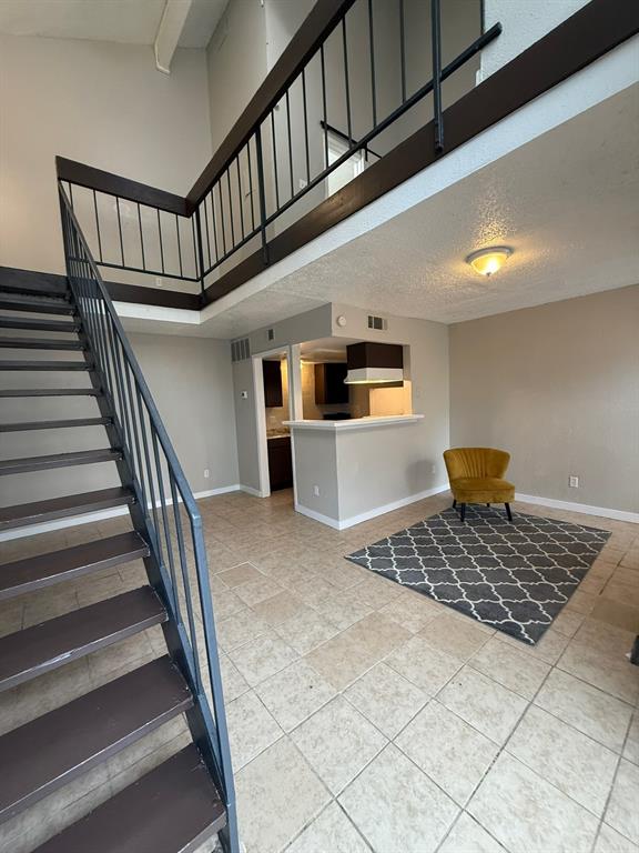 7152 Fair Oaks Avenue, Unit 1181 Dallas, TX 75231 - Photo 7 of 11 a view of entryway and hall