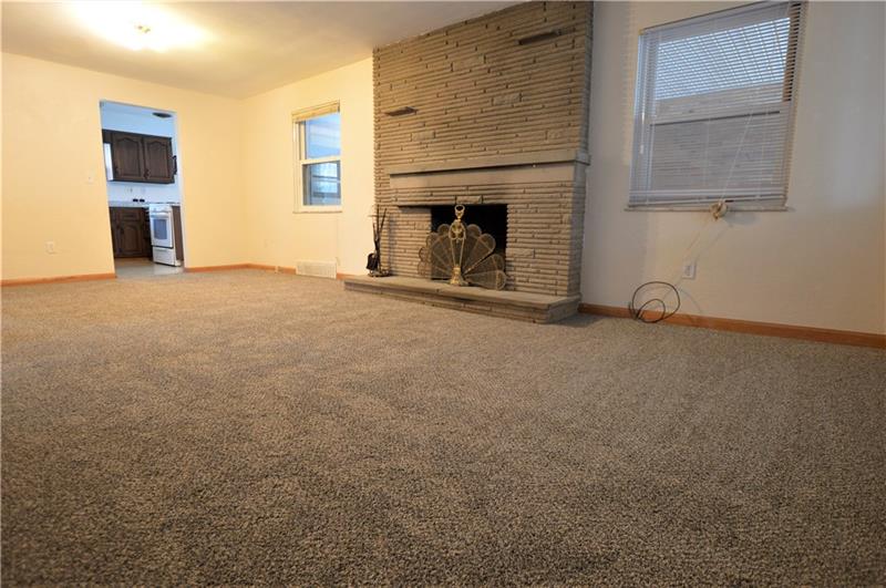 310 Old Jacks Run Road Irwin, PA 15642 - Photo 4 of 21 Living Room with wood burning fireplace