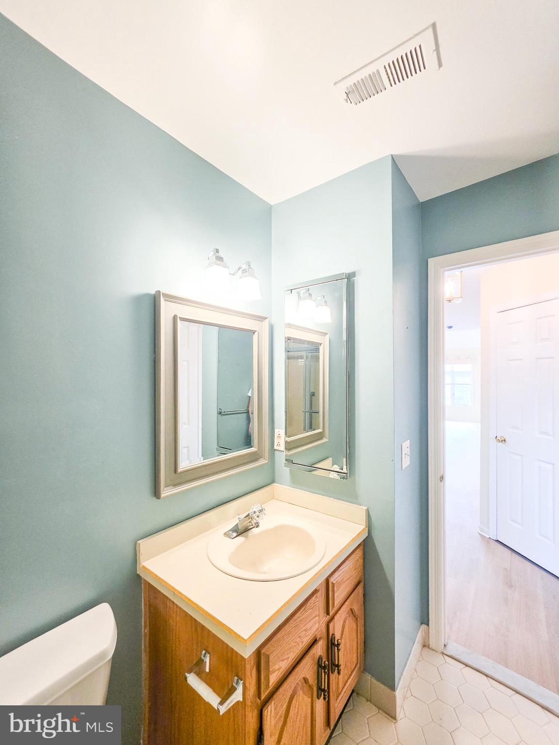1 Rutland Lane Monroe Township, NJ 08831 - Photo 11 of 26 a bathroom with a sink and a mirror