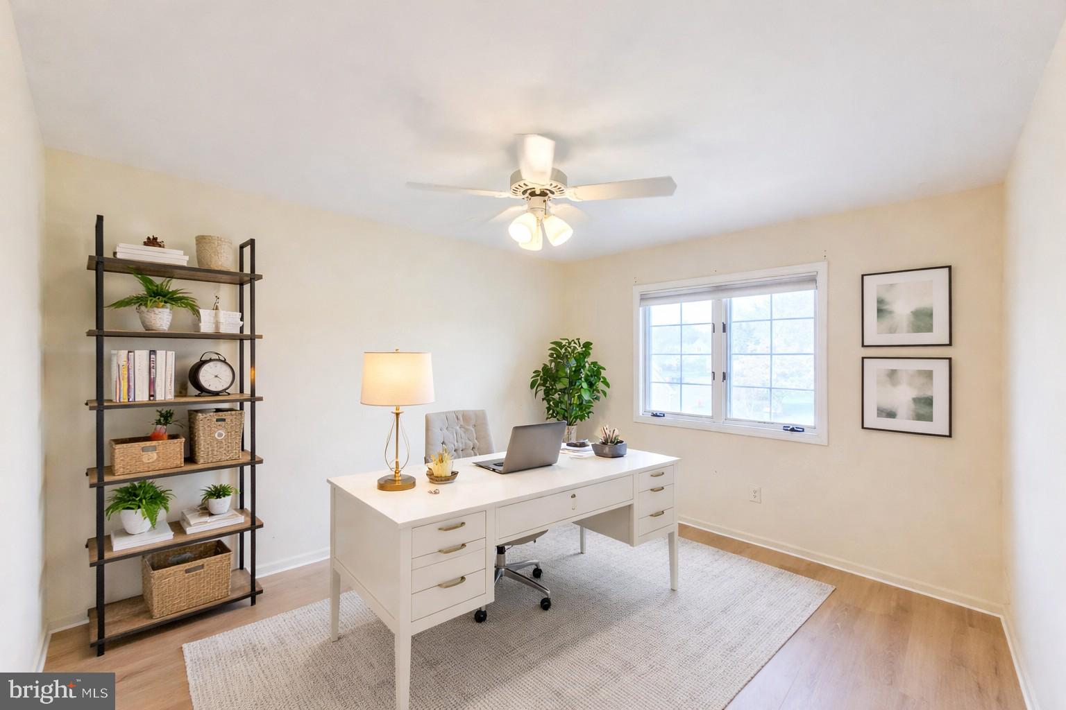 1 Rutland Lane Monroe Township, NJ 08831 - Photo 12 of 26 a living room with furniture a chandelier and a window
