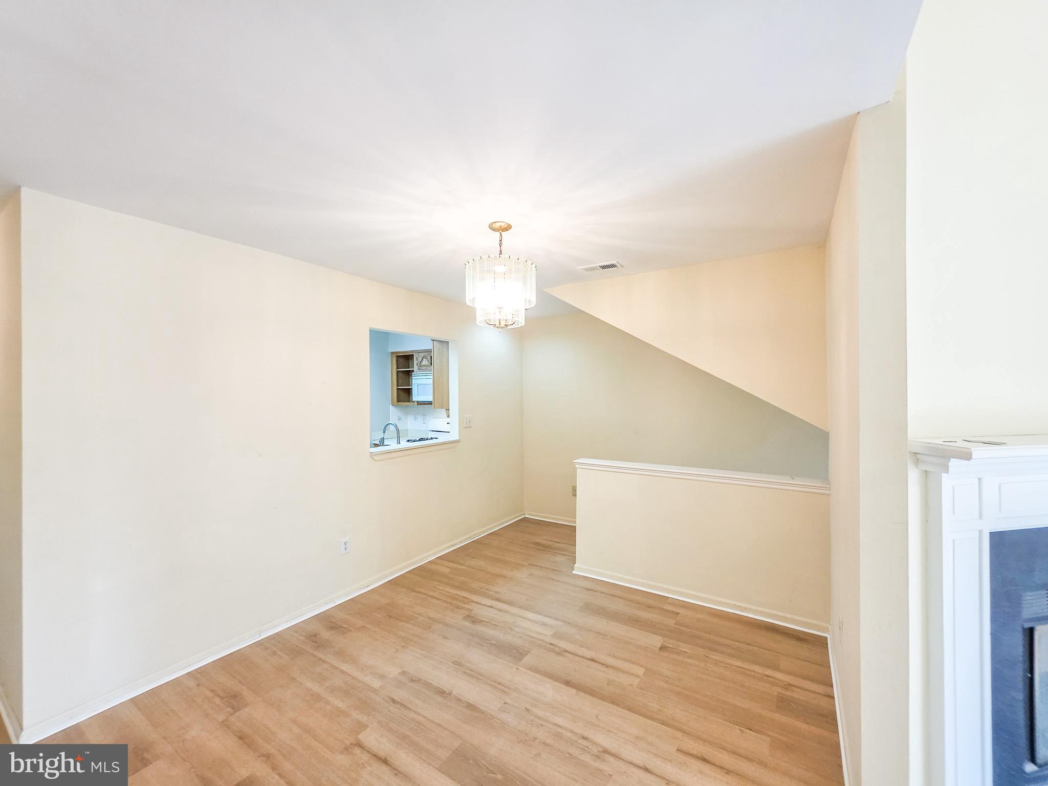 1 Rutland Lane Monroe Township, NJ 08831 - Photo 16 of 26 a view of empty room with wooden floor