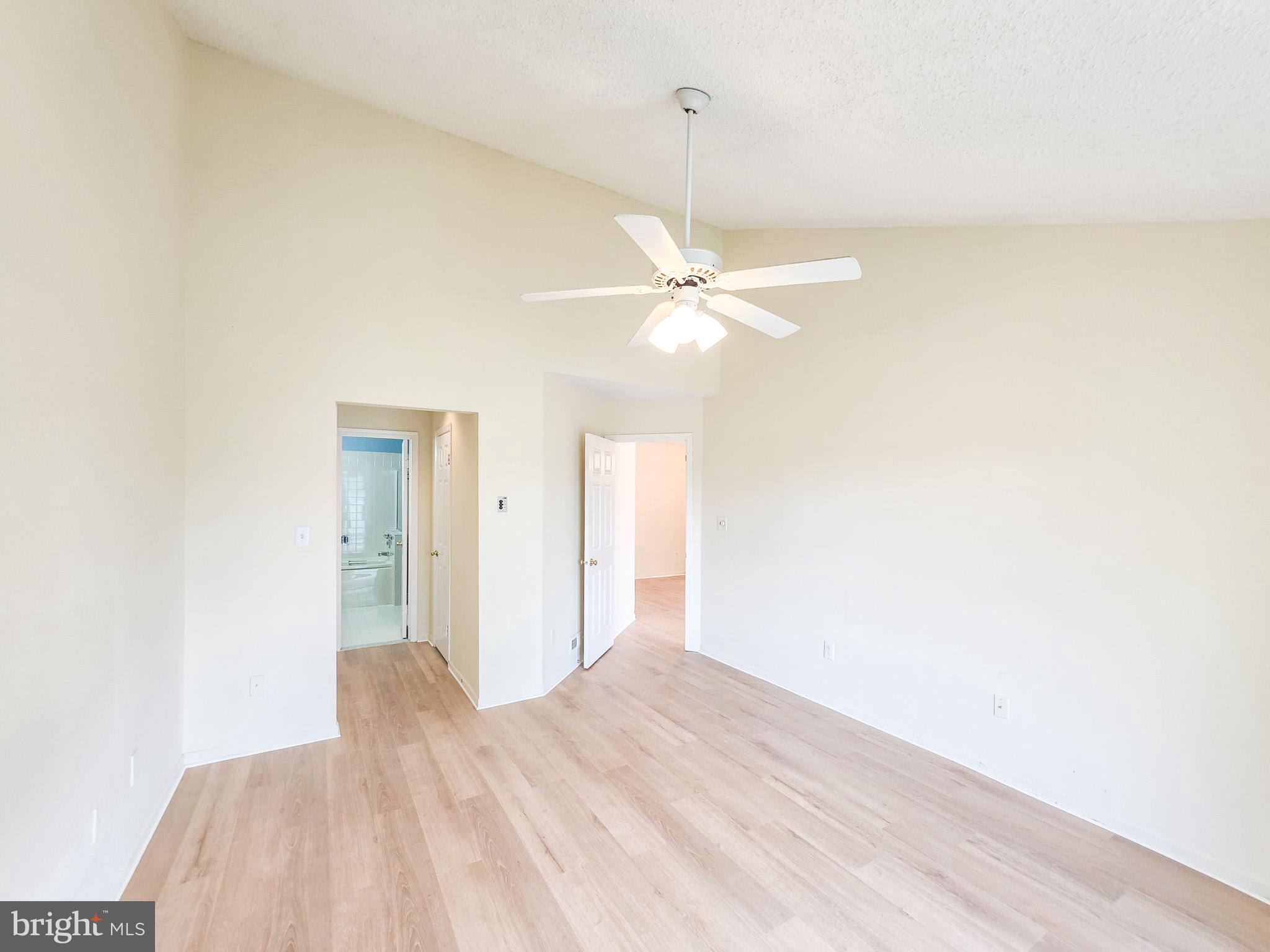 1 Rutland Lane Monroe Township, NJ 08831 - Photo 24 of 26 a bedroom with a bed and a chandelier fan