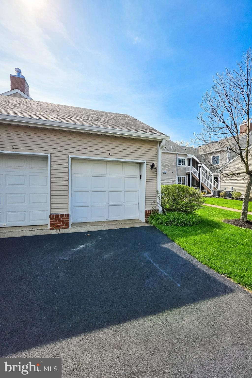 1 Rutland Lane Monroe Township, NJ 08831 - Photo 3 of 26 a view of backyard of house and garage