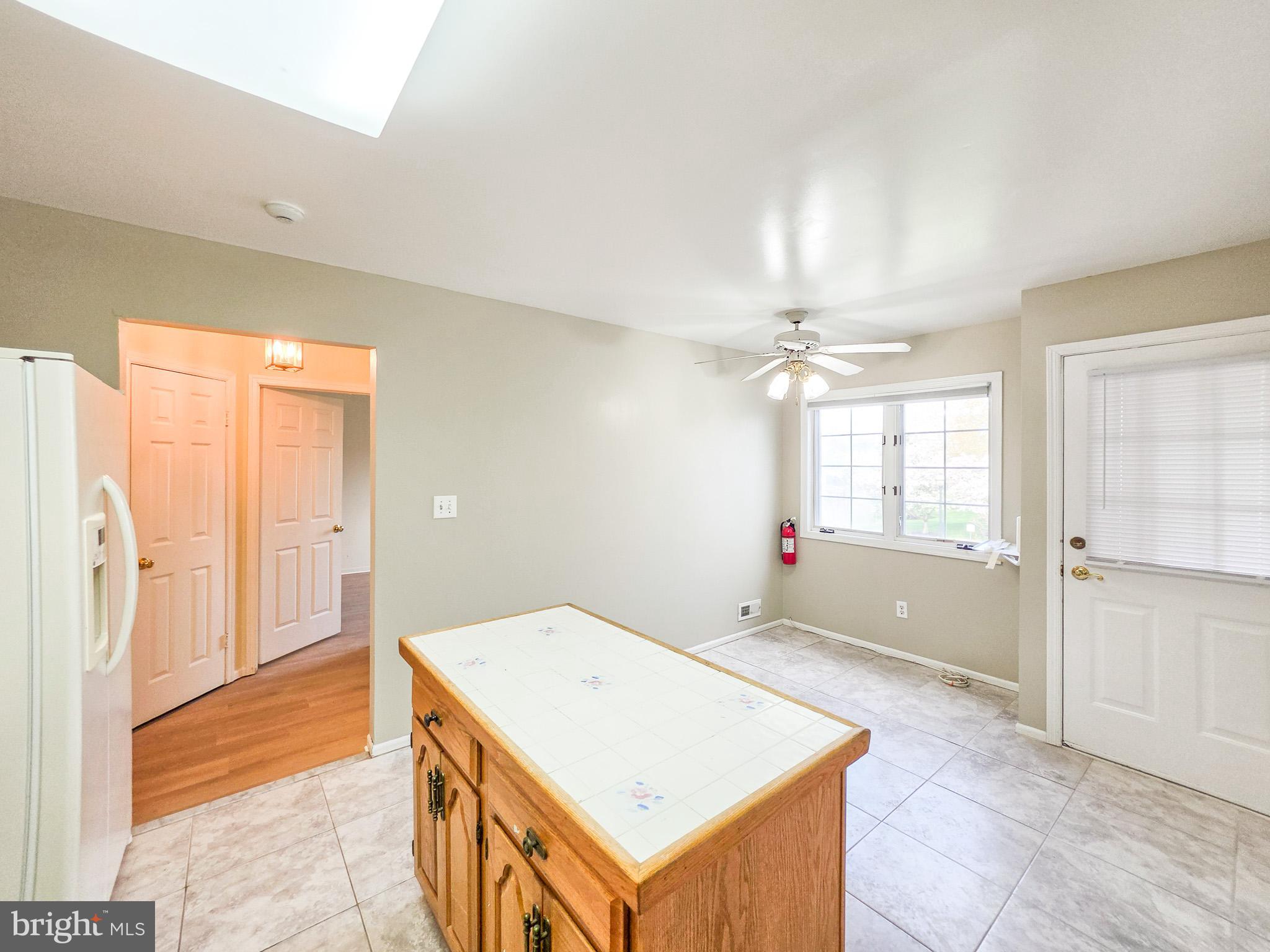 1 Rutland Lane Monroe Township, NJ 08831 - Photo 6 of 26 a view of livingroom with hardwood floor and front door