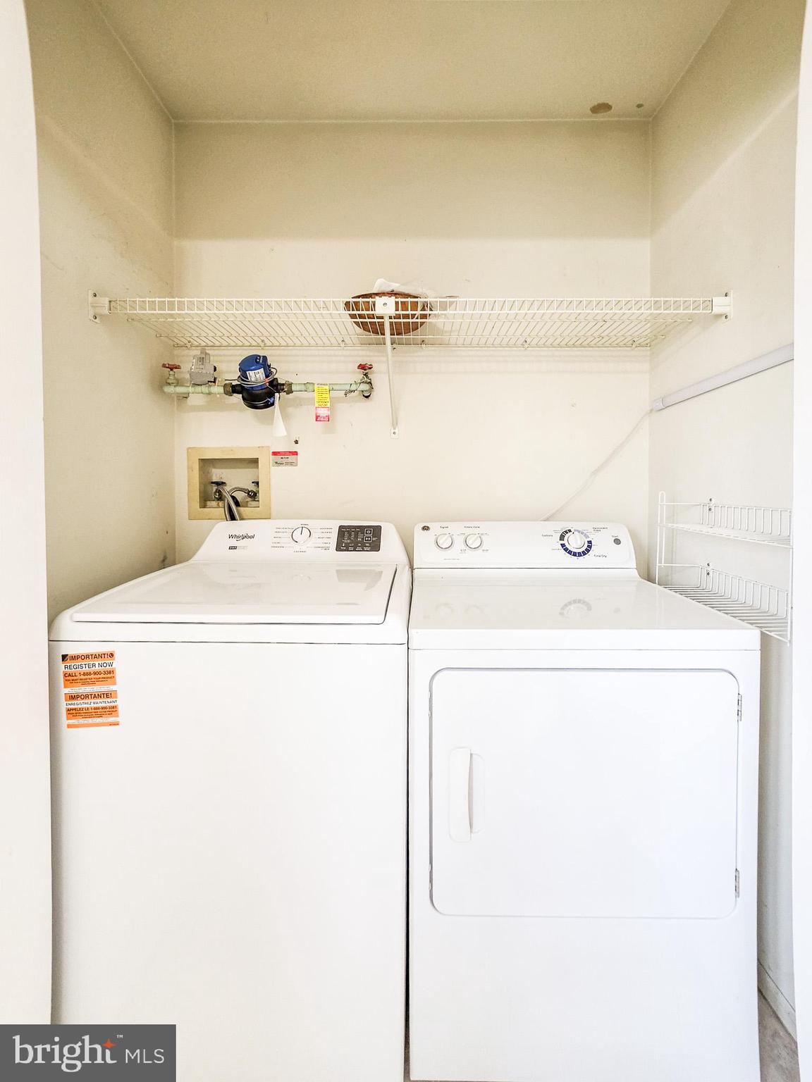 1 Rutland Lane Monroe Township, NJ 08831 - Photo 9 of 26 a utility room with dryer and washer