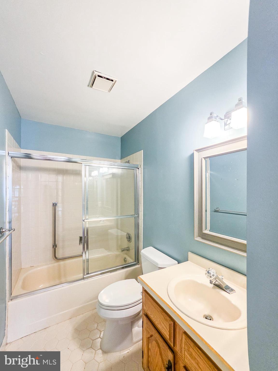 1 Rutland Lane Monroe Township, NJ 08831 - Photo 10 of 26 a bathroom with a sink a toilet and shower