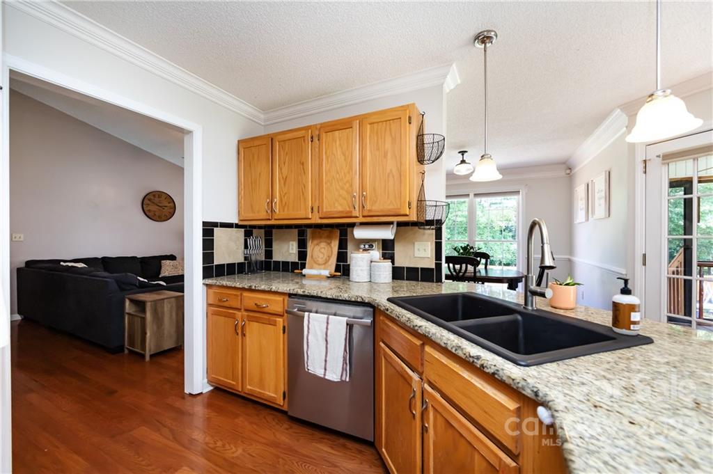 7760 Wallace Lane Denver, NC 28037 - Photo 13 of 48 a kitchen that has a sink and a stove
