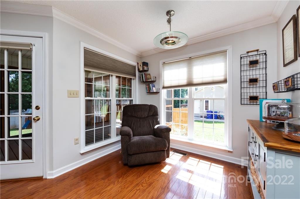 7760 Wallace Lane Denver, NC 28037 - Photo 18 of 48 a living room with furniture and a window