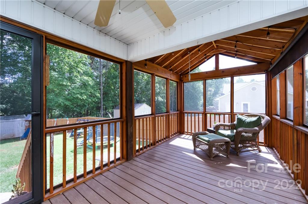 7760 Wallace Lane Denver, NC 28037 - Photo 22 of 48 a view of a balcony with furniture and wooden floor