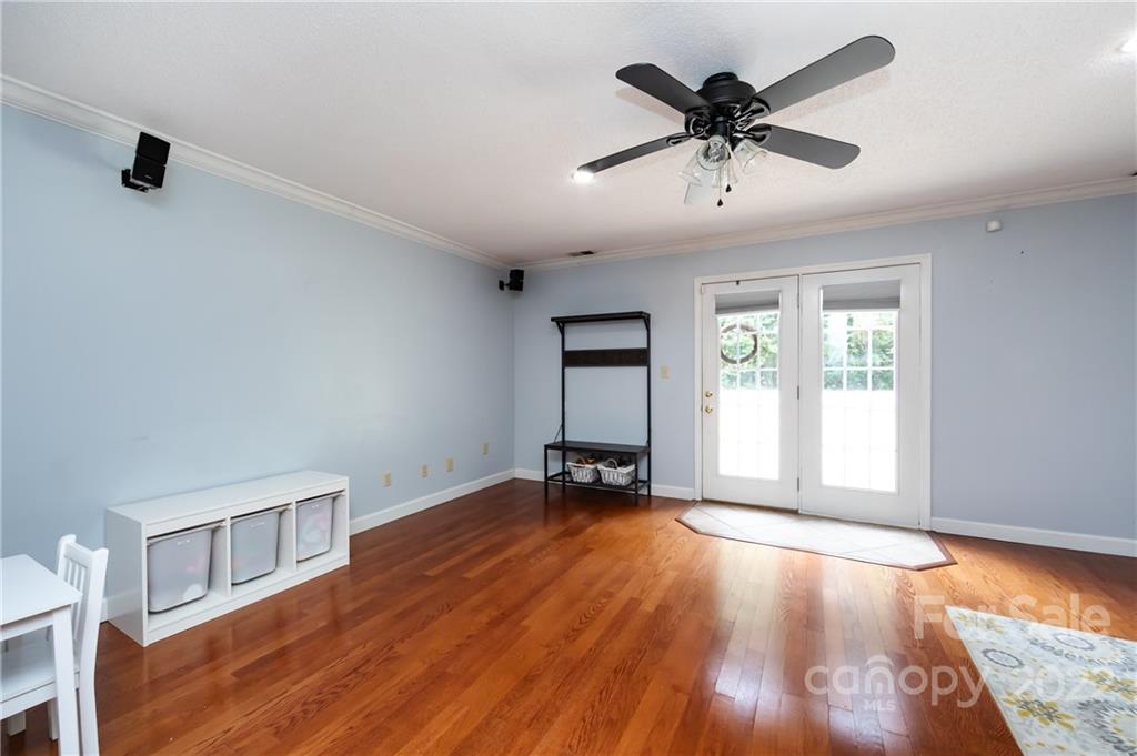 7760 Wallace Lane Denver, NC 28037 - Photo 23 of 48 wooden floor in an empty room with a window