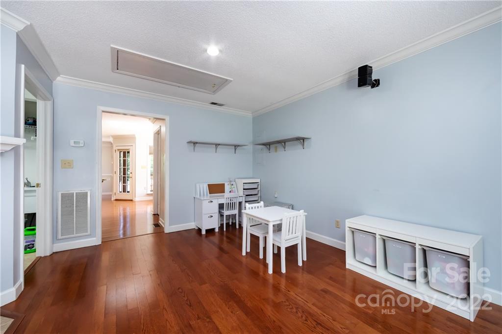 7760 Wallace Lane Denver, NC 28037 - Photo 27 of 48 a living room with furniture and a wooden floor