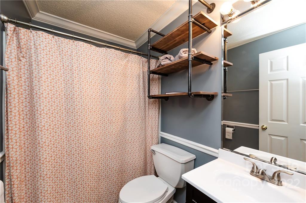 7760 Wallace Lane Denver, NC 28037 - Photo 37 of 48 a bathroom with a sink and toilet