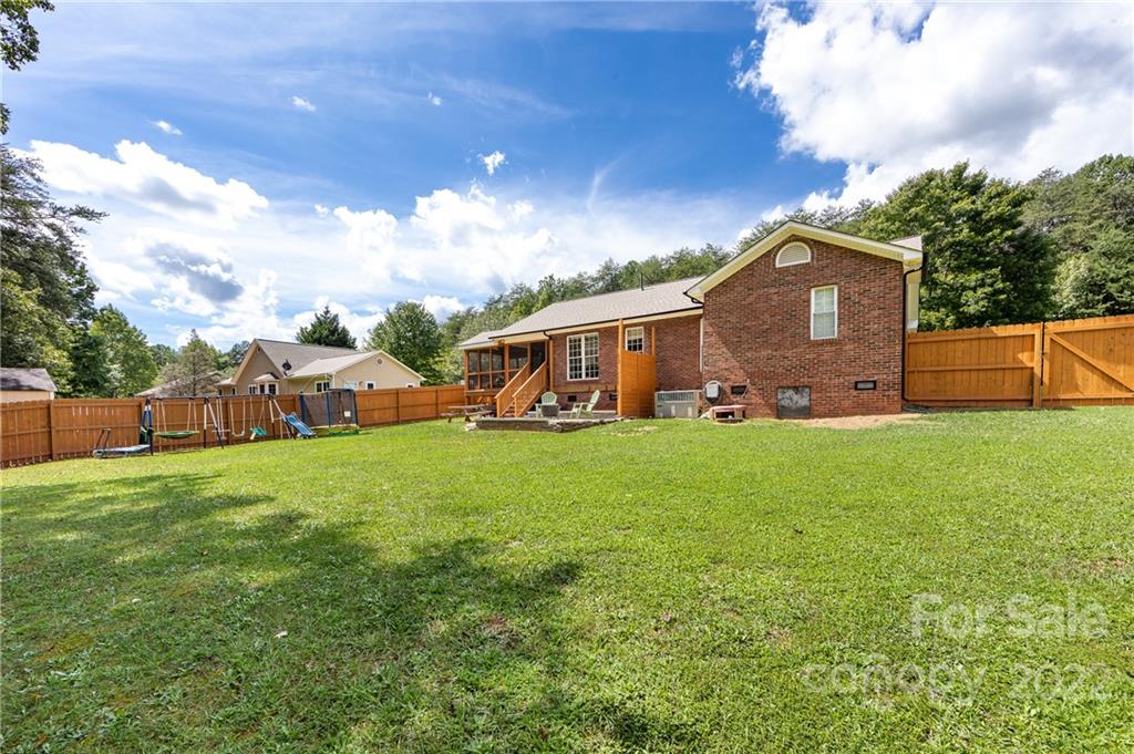 7760 Wallace Lane Denver, NC 28037 - Photo 42 of 48 a front view of a house with garden