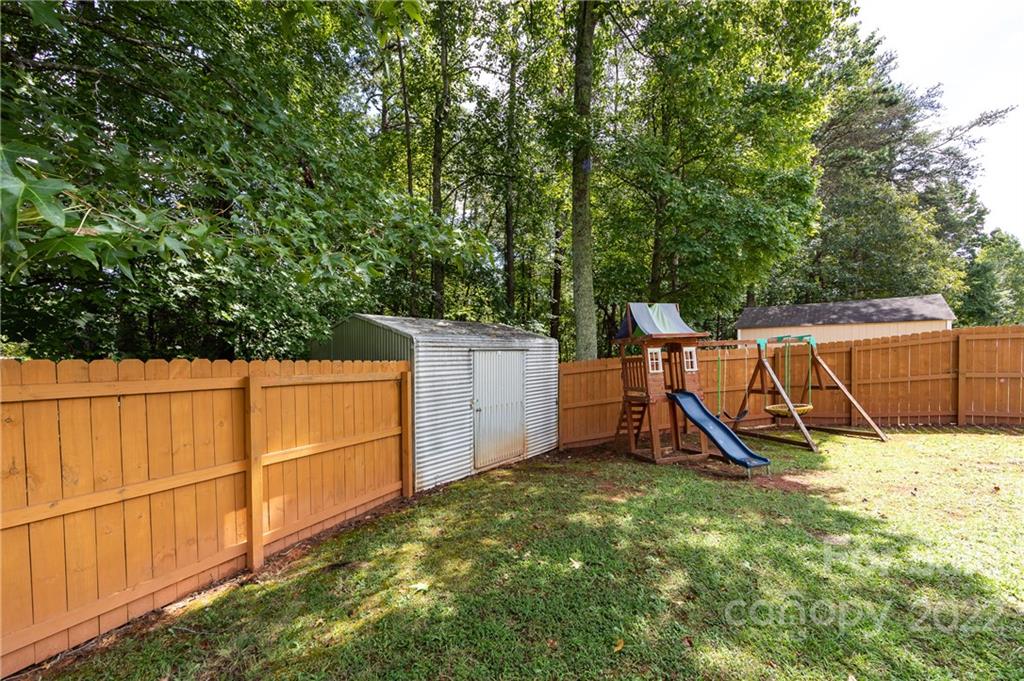 7760 Wallace Lane Denver, NC 28037 - Photo 43 of 48 a view of a backyard