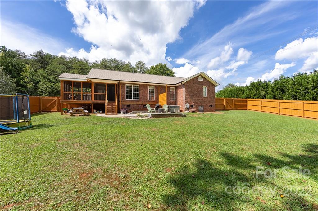 7760 Wallace Lane Denver, NC 28037 - Photo 44 of 48 a view of a house with a big yard and potted plants
