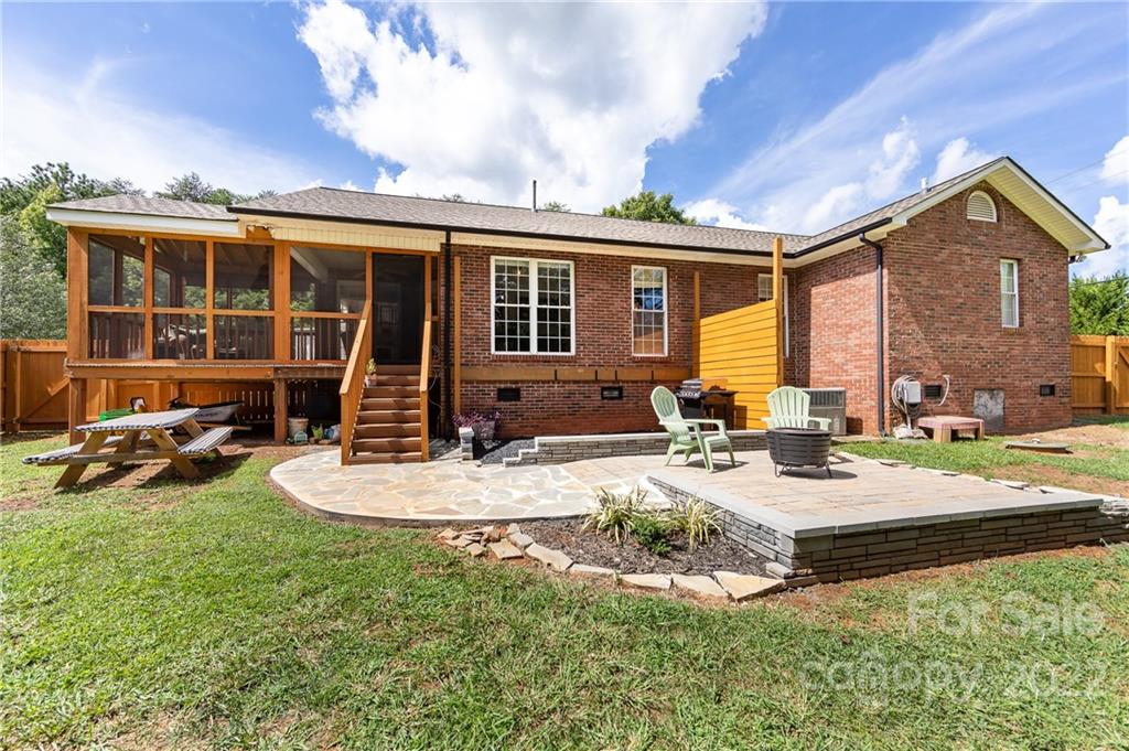 7760 Wallace Lane Denver, NC 28037 - Photo 45 of 48 a view of a house with backyard porch and sitting area
