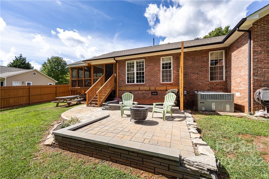 7760 Wallace Lane Denver, NC 28037 - Photo 46 of 48 a view of a house with backyard sitting area
