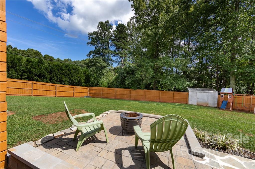7760 Wallace Lane Denver, NC 28037 - Photo 47 of 48 a view of a chairs and table in the yard