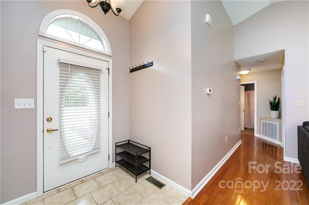 7760 Wallace Lane Denver, NC 28037 - Photo 5 of 48 a view of an entryway with wooden floor