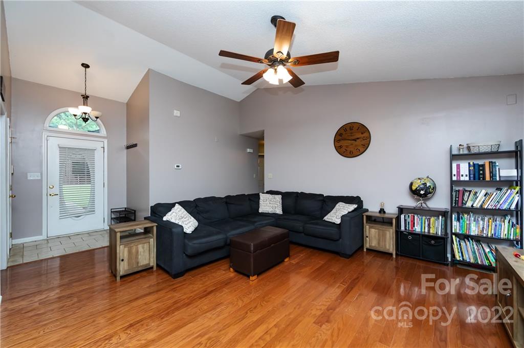 7760 Wallace Lane Denver, NC 28037 - Photo 9 of 48 a living room with furniture and a wooden floor