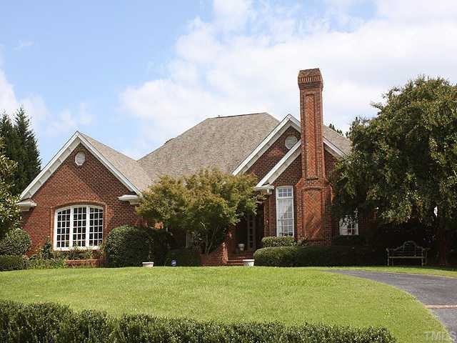 4000 John S Raboteau Wynd Raleigh, NC 27612 - Photo 1 of 12 a front view of a house with yard and green space