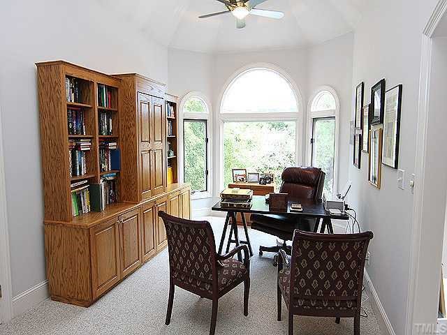 4000 John S Raboteau Wynd Raleigh, NC 27612 - Photo 9 of 12 a view of a workspace with furniture and a window