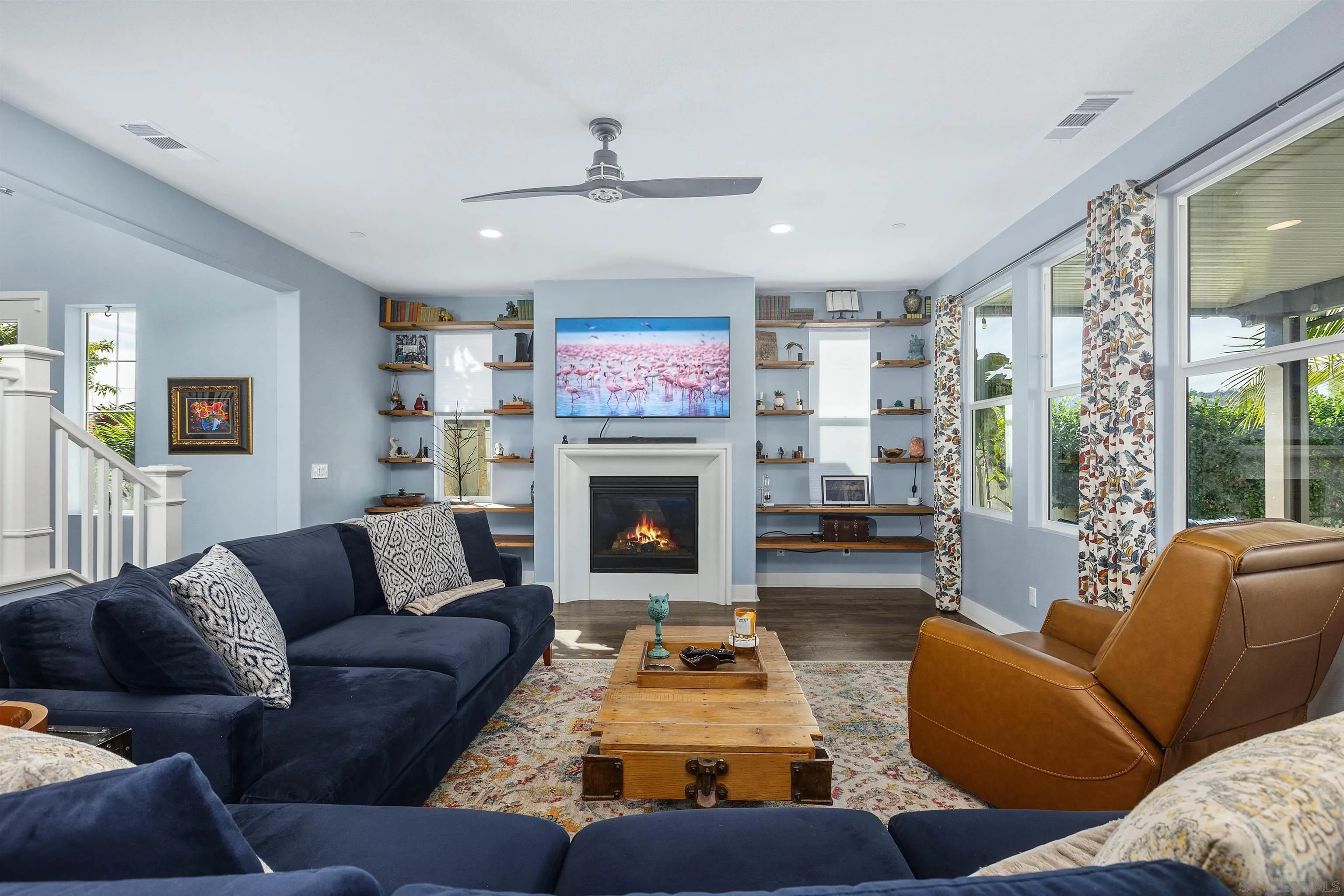 238 Ventasso Way Fallbrook, CA 92028 - Photo 12 of 52 a living room with furniture fireplace and a large window
