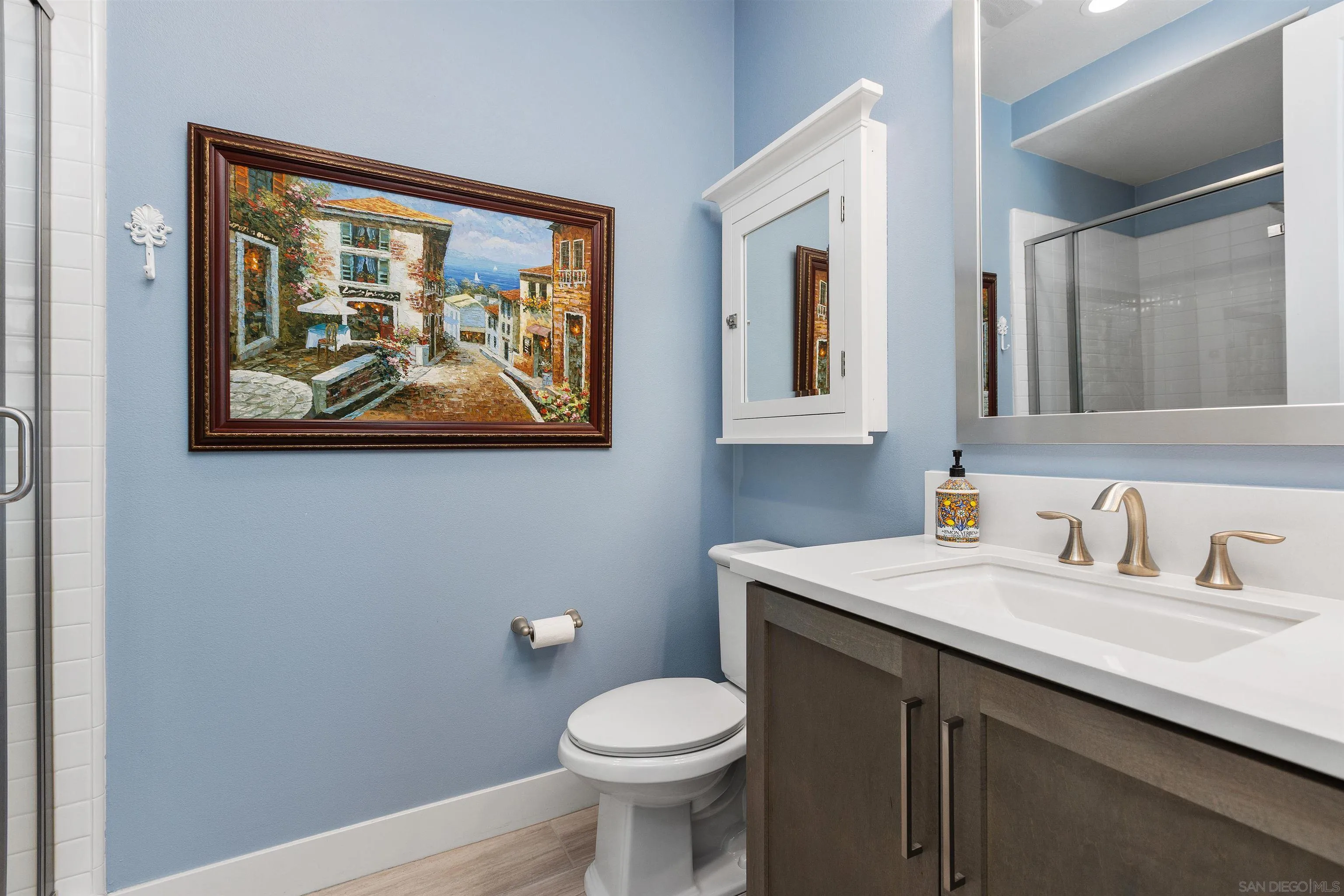 238 Ventasso Way Fallbrook, CA 92028 - Photo 21 of 52 a bathroom with a toilet sink and mirror