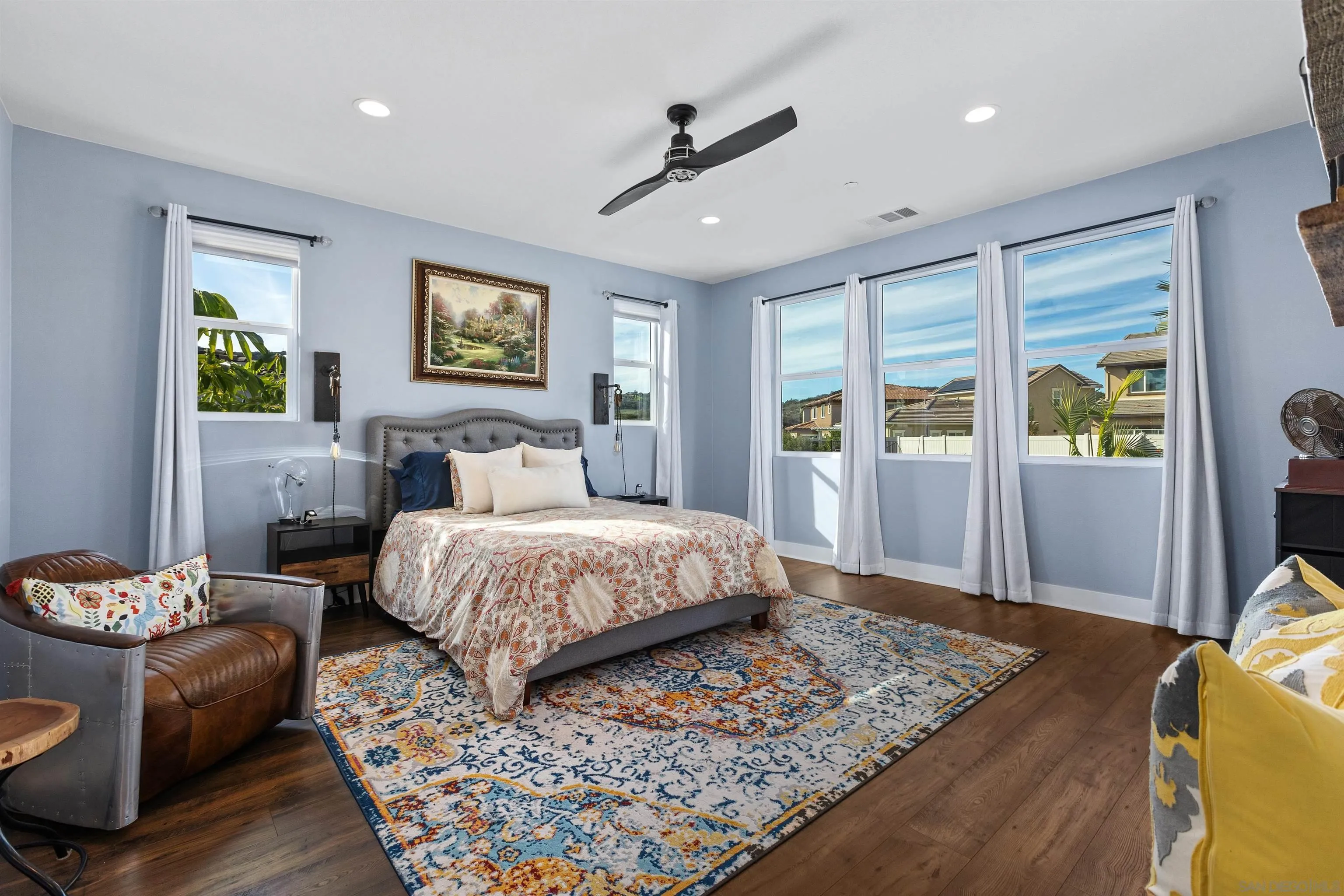 238 Ventasso Way Fallbrook, CA 92028 - Photo 24 of 52 a bedroom with a large bed and a window