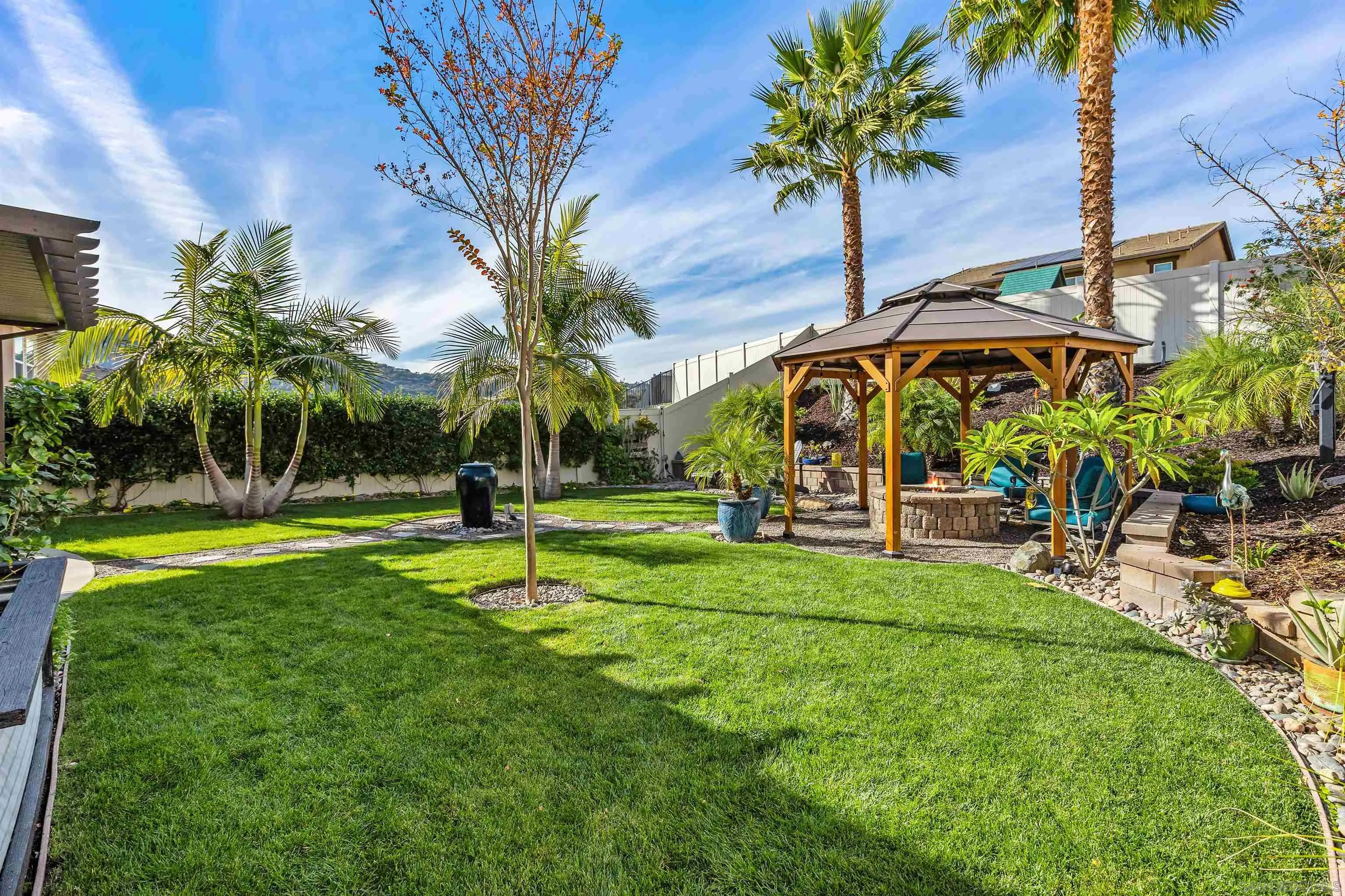 238 Ventasso Way Fallbrook, CA 92028 - Photo 34 of 52 a view of a garden with a slide