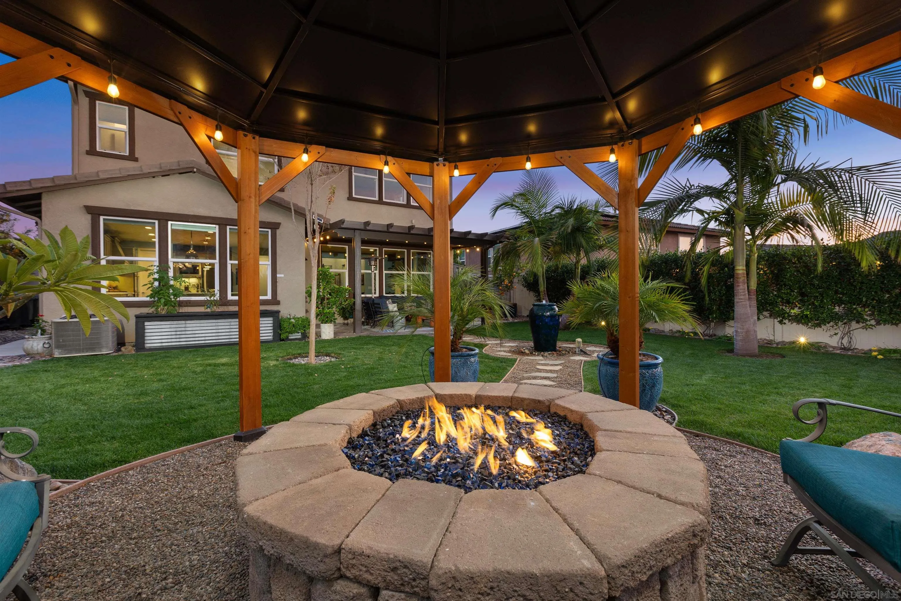 238 Ventasso Way Fallbrook, CA 92028 - Photo 38 of 52 a view of a house with backyard sitting area and garden