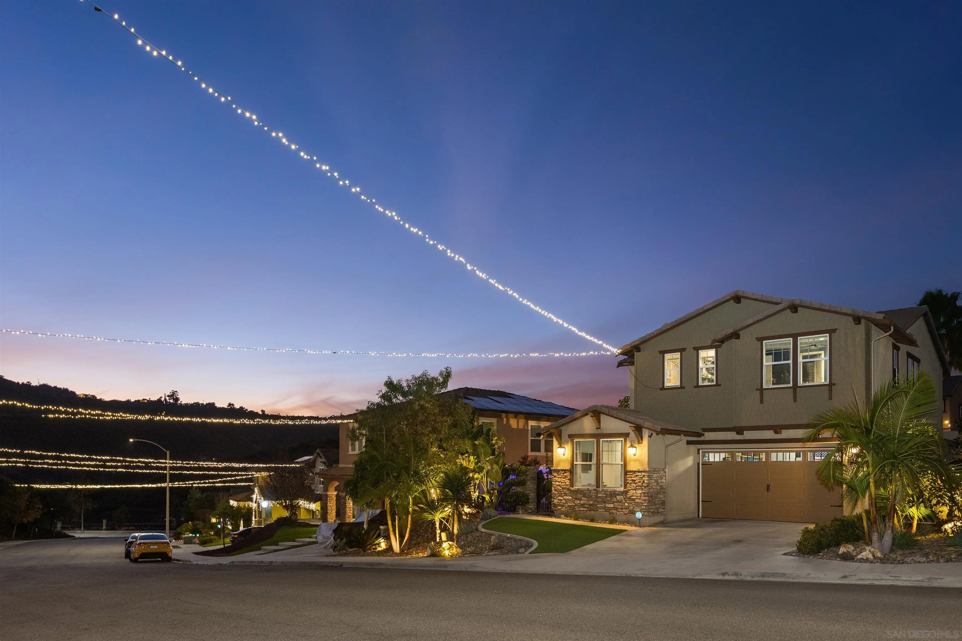 238 Ventasso Way Fallbrook, CA 92028 - Photo 45 of 52 a city street lined with parked cars and a building