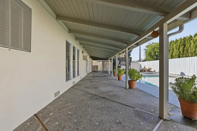 a view of a house with a tree