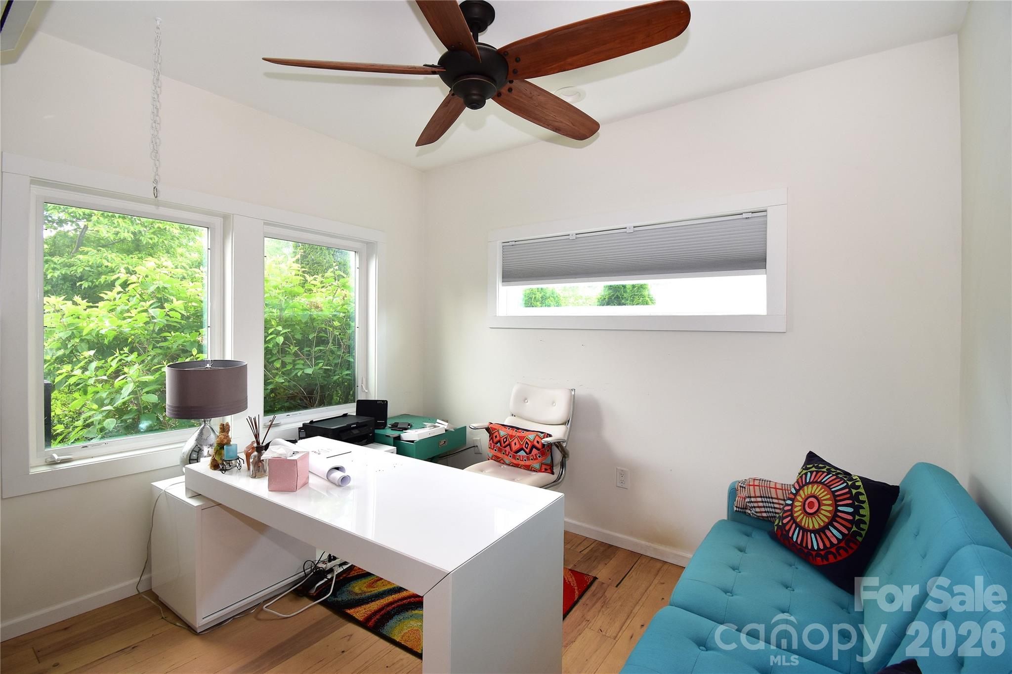 6 Belvedere Road Asheville, NC 28803 - Photo 11 of 33 a view of a workspace with furniture and a window
