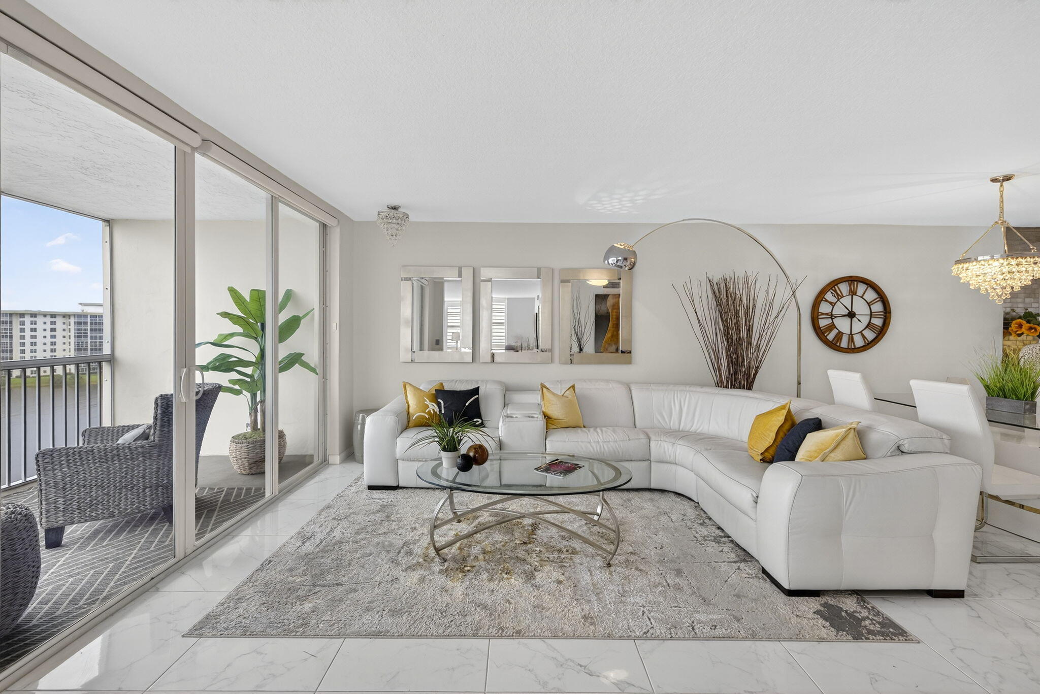 3091 North Course Drive, Unit 710 Pompano Beach, FL 33069 - Photo 12 of 46 a living room with furniture and wooden floor